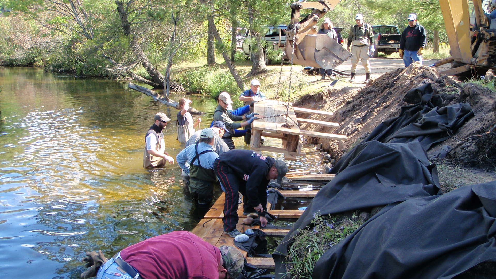 Lunker structure being installed at Pollack Bridge on the Au Sable River